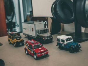 red and white car scale model